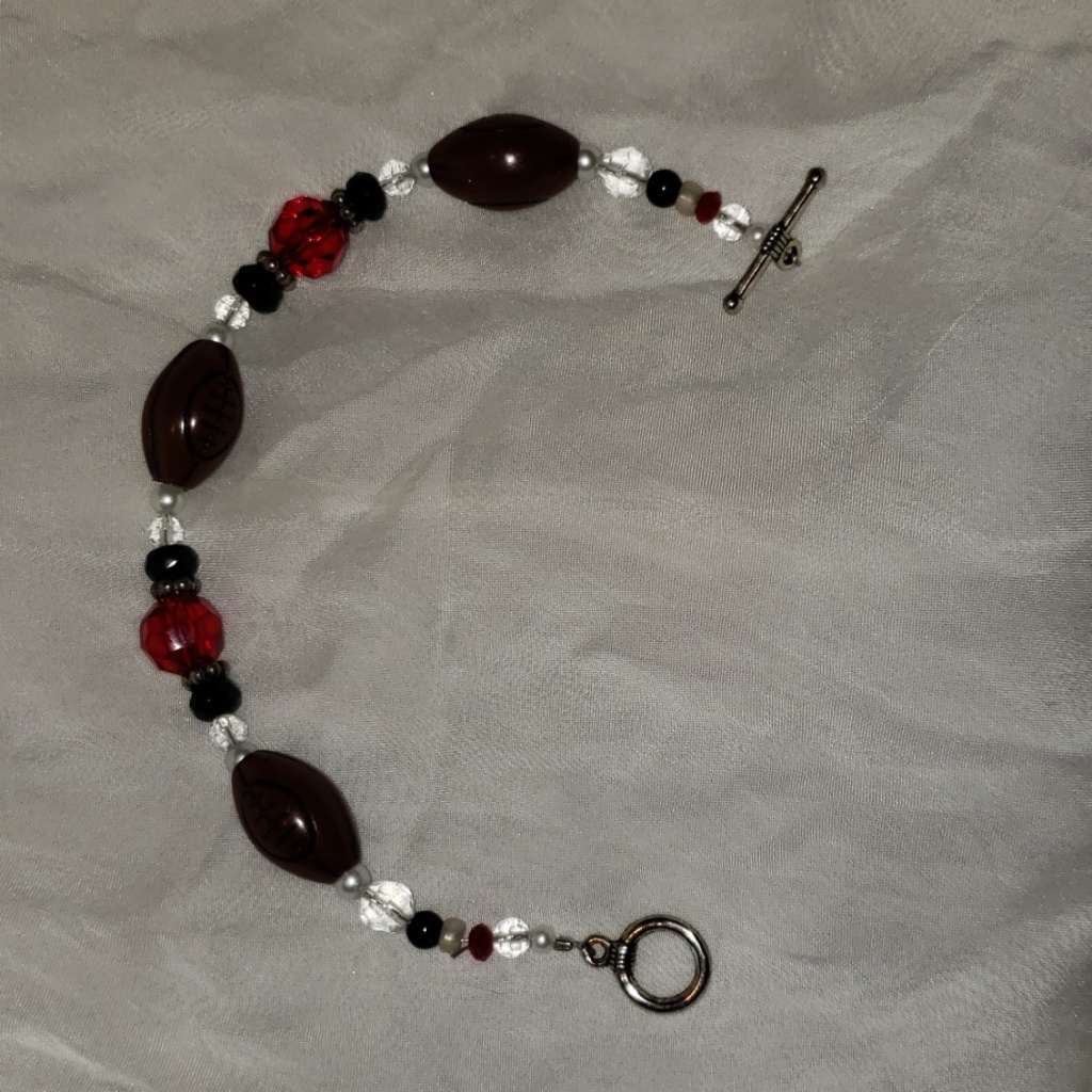 A Football Bracelet 13$
